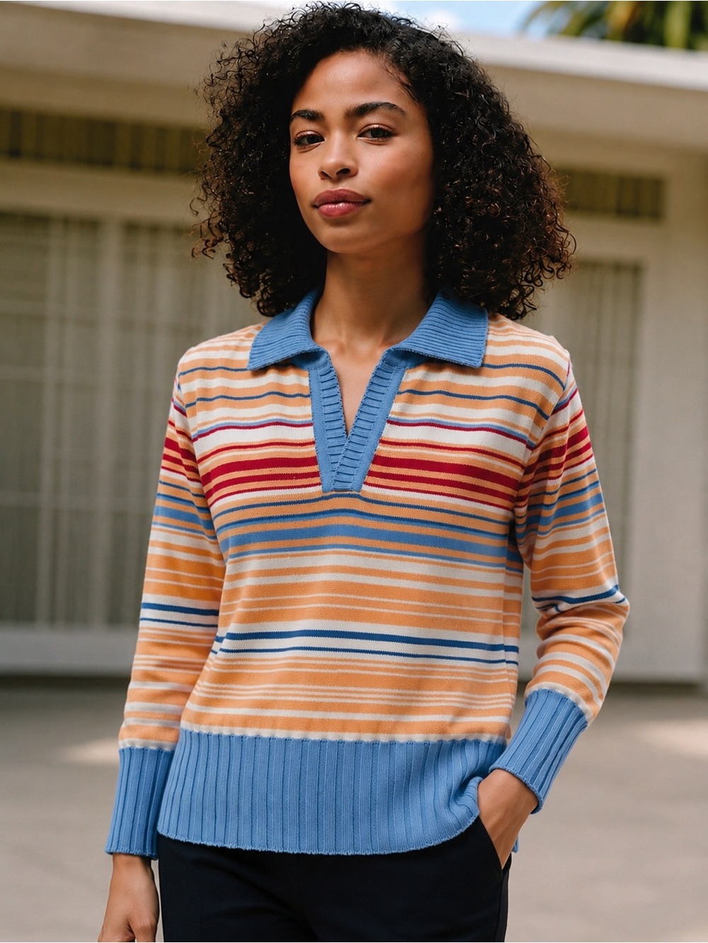 UNI. Knitted polo-style sweater with sleeves (size M). This piece features a mul